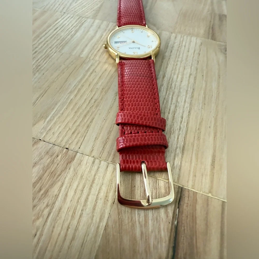 Bulova gold tone red leather watch NEW BATTERY